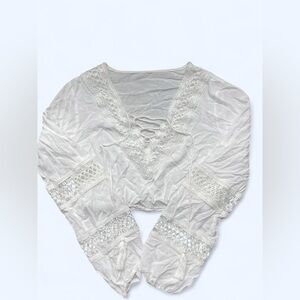 White lace design crop top with tie front and bell sleeves size XS